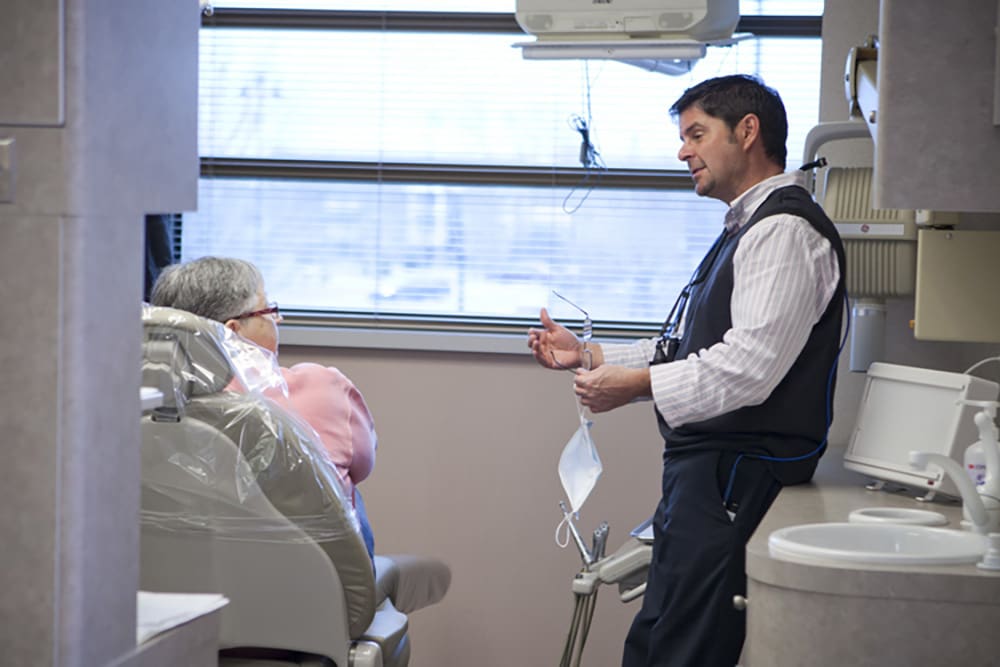 Dr. Crinzi speaking with a patient at Sunnyslope Dental Care